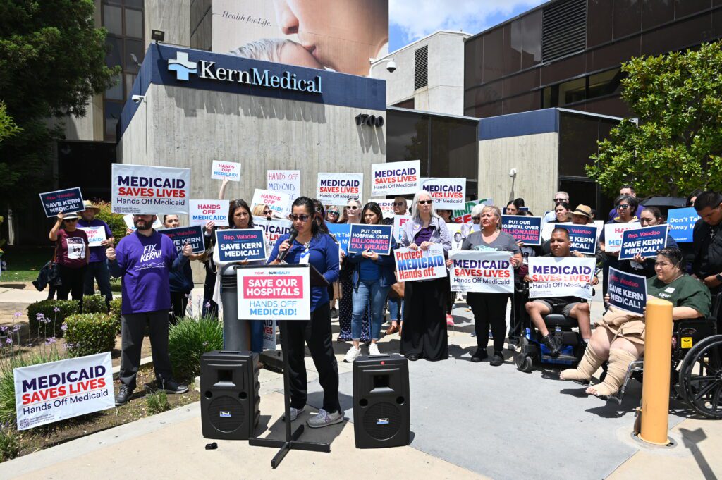 Community members gather to protest cuts to Medicaid