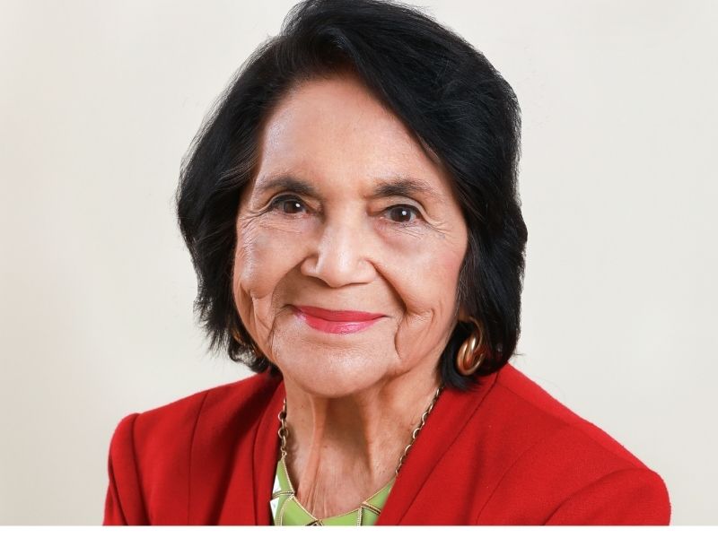 Dolores Huerta Headshot Red Suit
